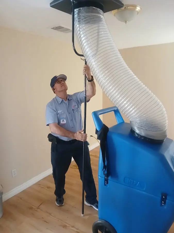 HVAC Installation technician using HEPA equipment in Raisin